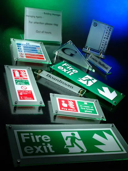Collection of various glass look health and safety signs