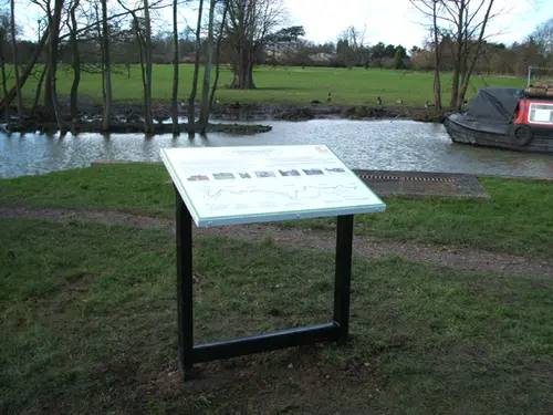 Metal Angled Information Sign in park