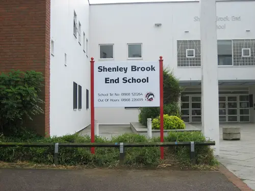 Free standing school name sign with phone numbers