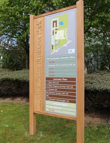 Large parking information sign featuring company name