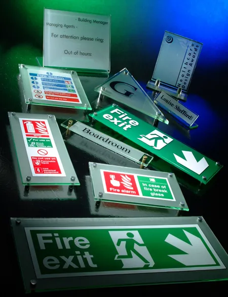 Collection of various glass look health and safety signs