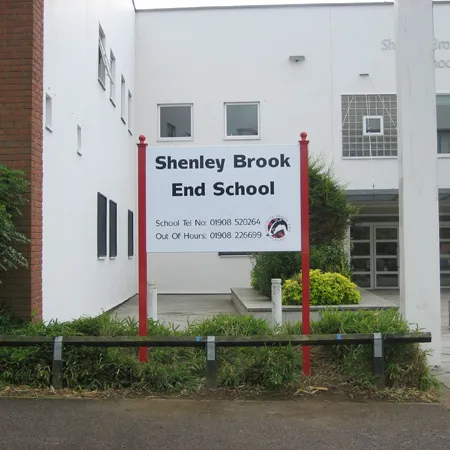 Free standing school name sign with phone numbers